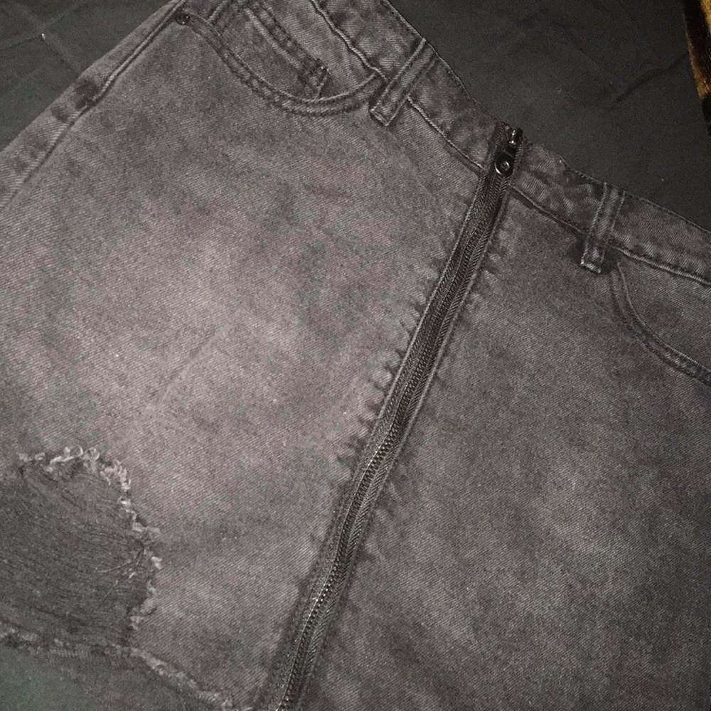 Black ripped denim skirt 🥰 or a flat 20 cash a